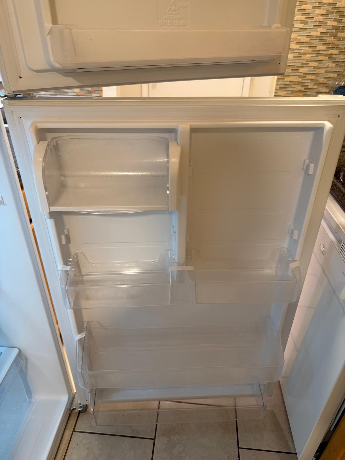 Refrigerator cleaned by D&D Cleaning Services